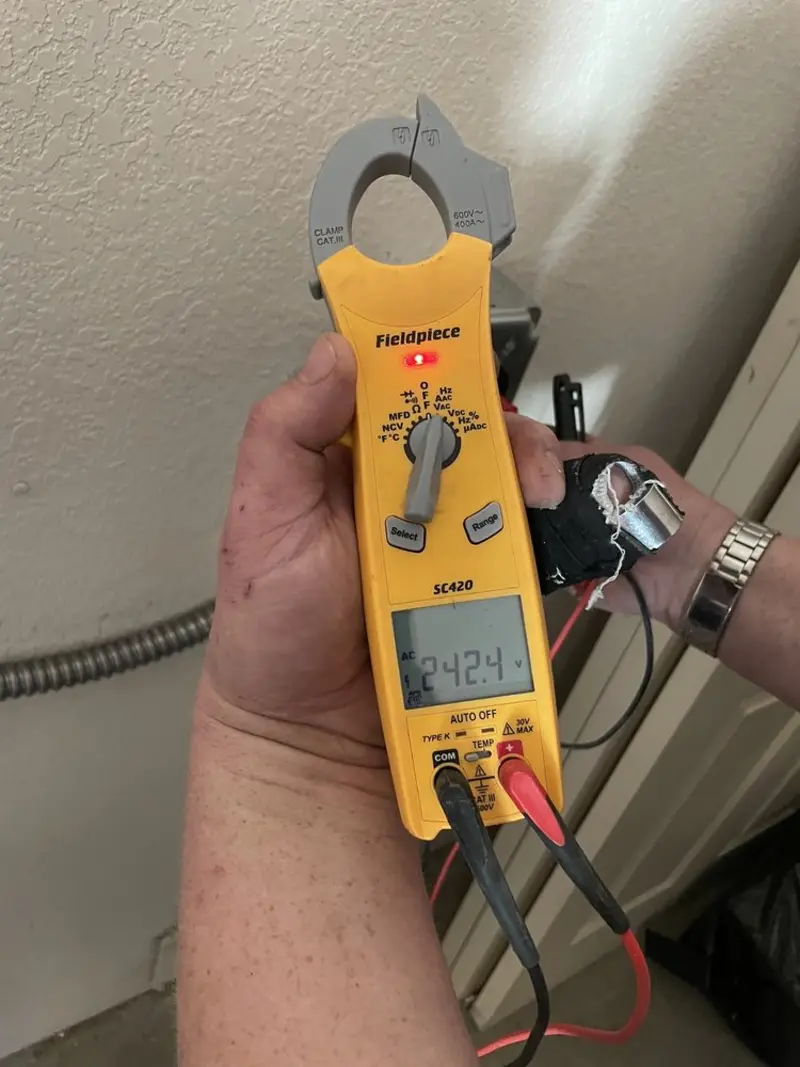 Voltage testing with clamp meter during Aluminum Wiring Replacement in North Coventry